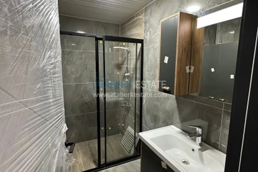 Приобрести Квартира 1+1 с чистовой отделкой в новом жилом комплексе район Арпачбахшиш – Мерсин 5 