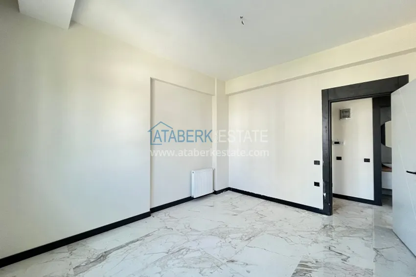 Приобрести Квартира 2+1 в комплексе с инфраструктурой комфорт-класса район Чифтликкей-Мерсин 10 