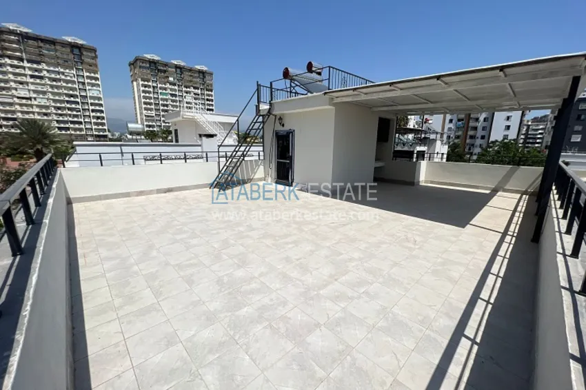 Приобрести Двухэтажная вилла с террасой и частной территорией в районе Чешмели-Мерсин 21 