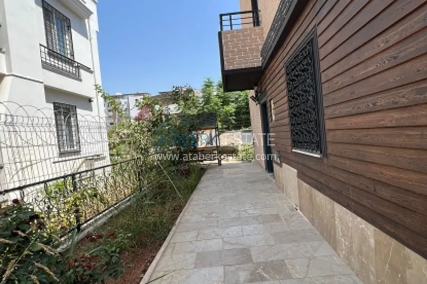 Двухэтажная вилла с террасой и частной территорией в районе Чешмели-Мерсин 7 