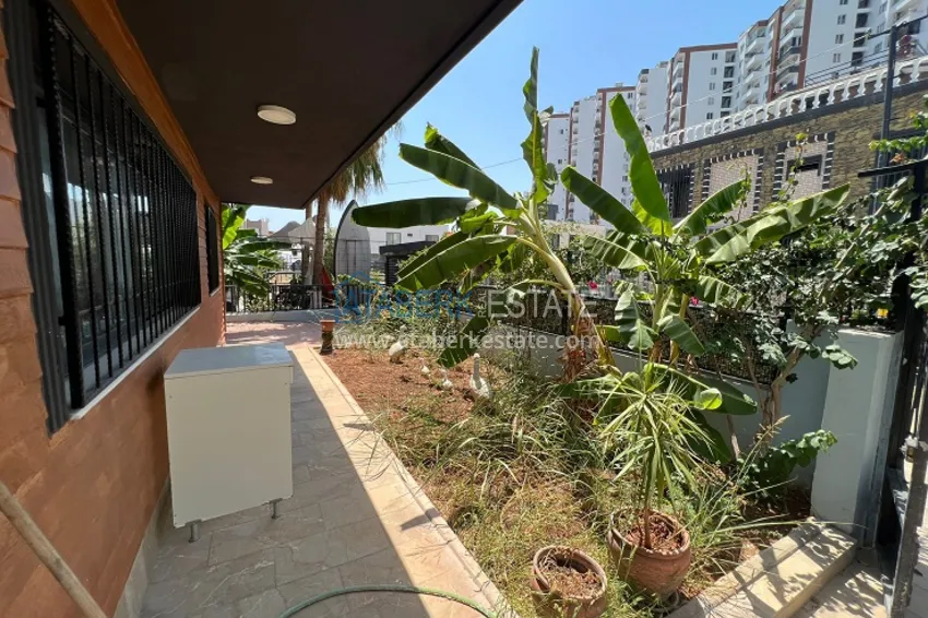 Двухэтажная вилла с террасой и частной территорией в районе Чешмели-Мерсин 10 