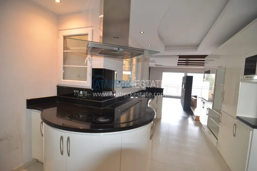 Приобрести Пентхаус-дуплекс 5+2 частично меблированный с видом на море и горы, подходит под гражданство – центр Алании 10