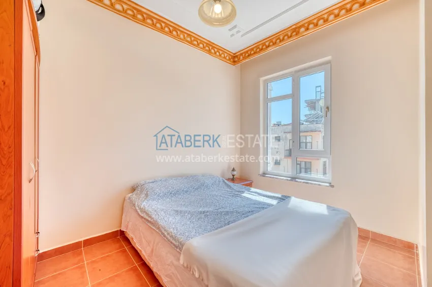 Приобрести Трехкомнатная меблированная квартира в центре Алании в комплексе городского типа 11 