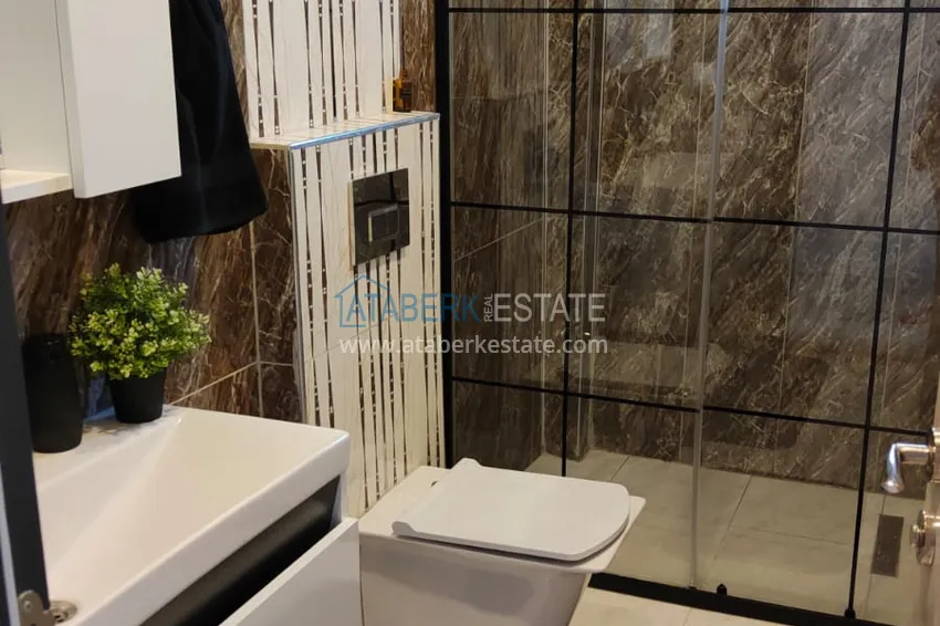 Приобрести  Срочная продажа! Квартира 2+1 с мебелью и выходом к бассейну в Авсалларе, Алания 9 