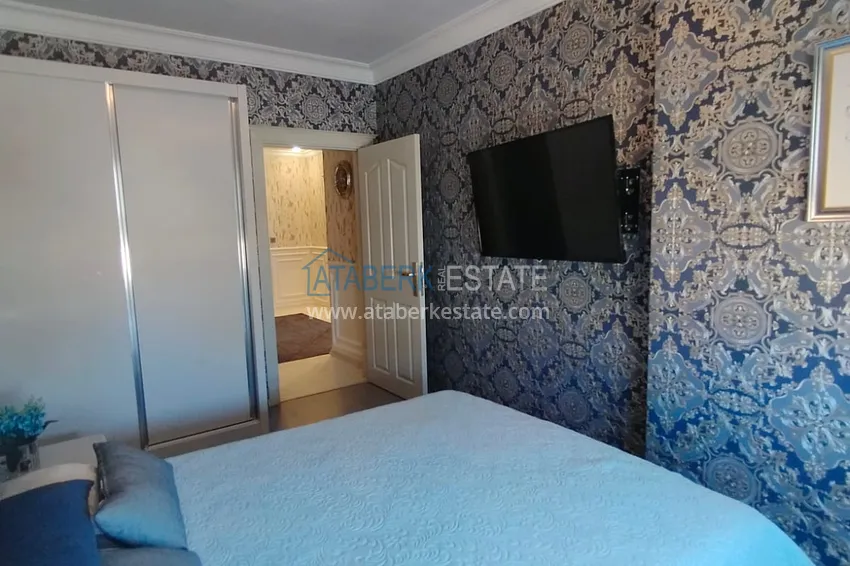 Приобрести Дуплекс 4+1 с мебелью и видом на горы в благоустроенном комплексе, район Махмутлар - Алания  12 