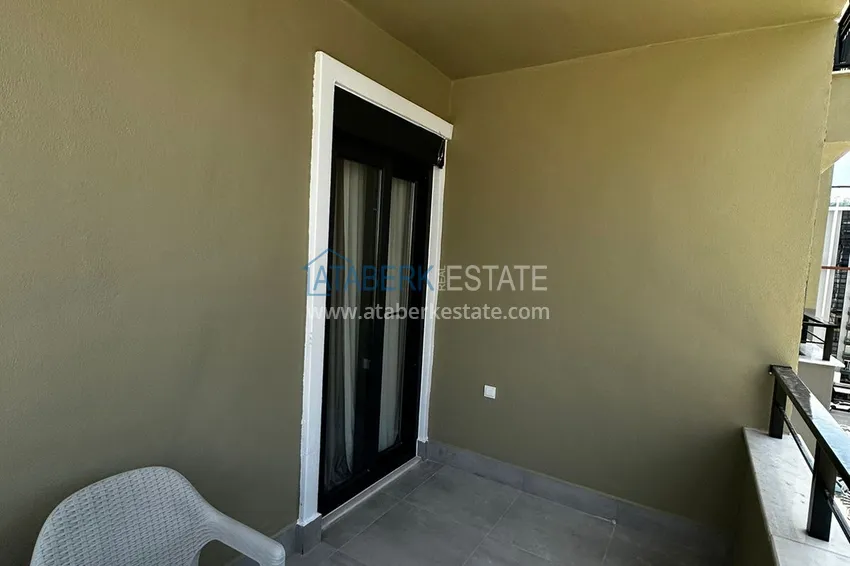 Приобрести Квартира 1+1 меблированная в новом жилом комплексе с инфраструктурой, район Махмутлар – Алания 12 