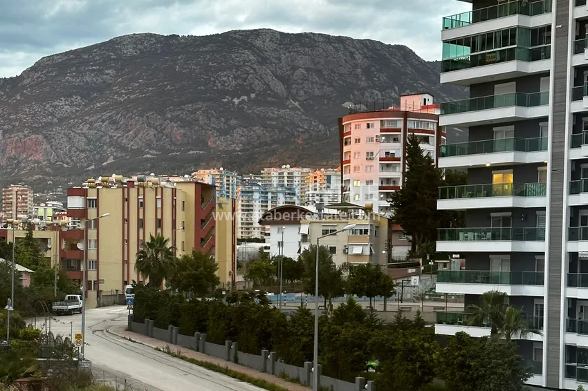 Приобрести Квартира 1+1 меблированная в новом жилом комплексе с инфраструктурой, район Махмутлар – Алания 13 