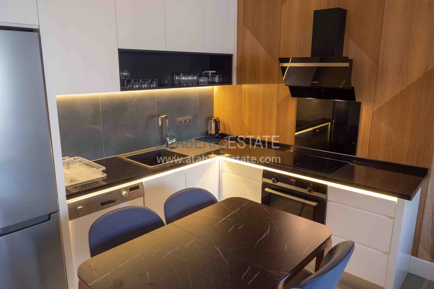 Приобрести Меблированная квартира с рассрочкой в центре Алании в шикарном жилом комплексе  15 