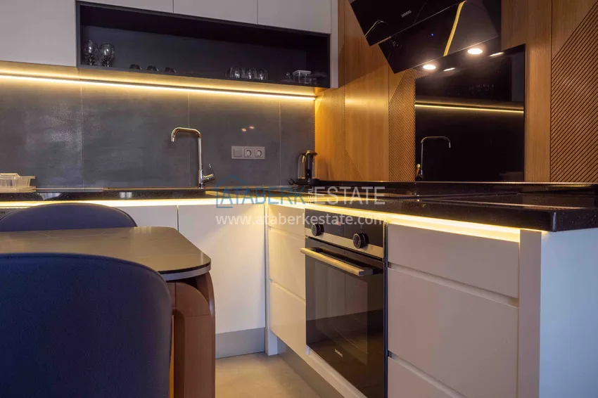 Приобрести Меблированная квартира с рассрочкой в центре Алании в шикарном жилом комплексе  16 