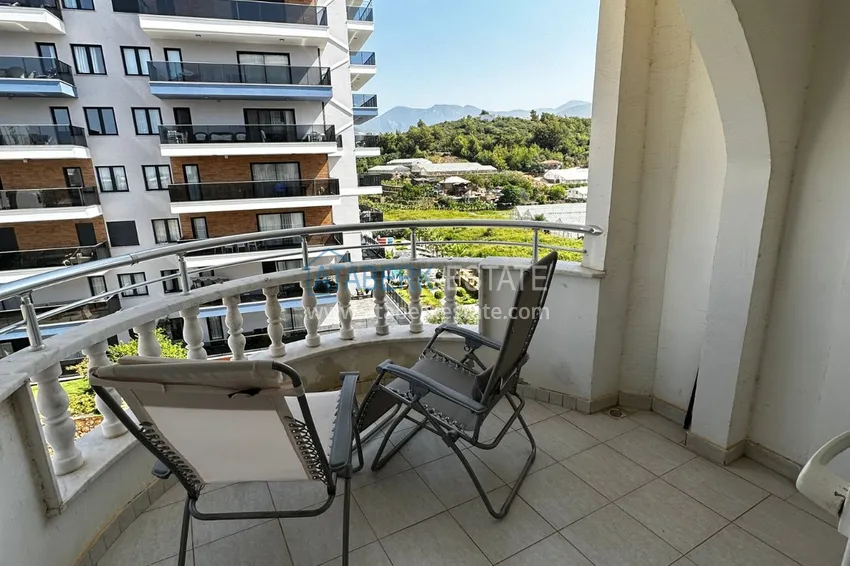 Приобрести Квартира 2+1 с мебелью и видом на горы в районе, открытом для ВНЖ, Тосмур – Алания 18 