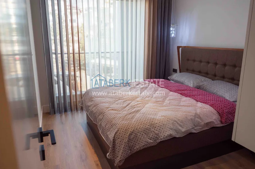 Приобрести Меблированная квартира с рассрочкой в центре Алании в шикарном жилом комплексе  21 