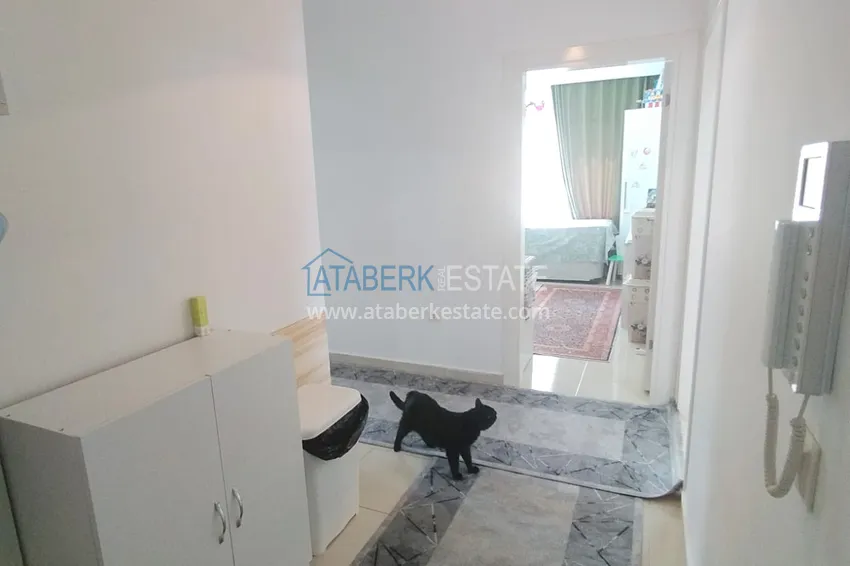 Приобрести Квартира 2+1 с мебелью и большим застеклённым балконом, район Махмутлар – Алания 1