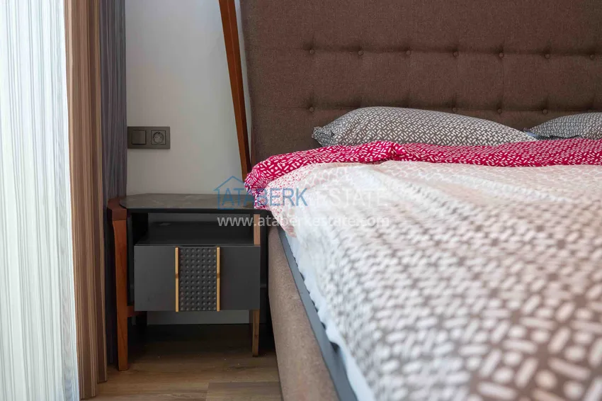 Приобрести Меблированная квартира с рассрочкой в центре Алании в шикарном жилом комплексе  24 