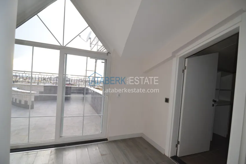 Приобрести Пентхаус-дуплекс 5+2 частично меблированный с видом на море и горы, подходит под гражданство – центр Алании 26