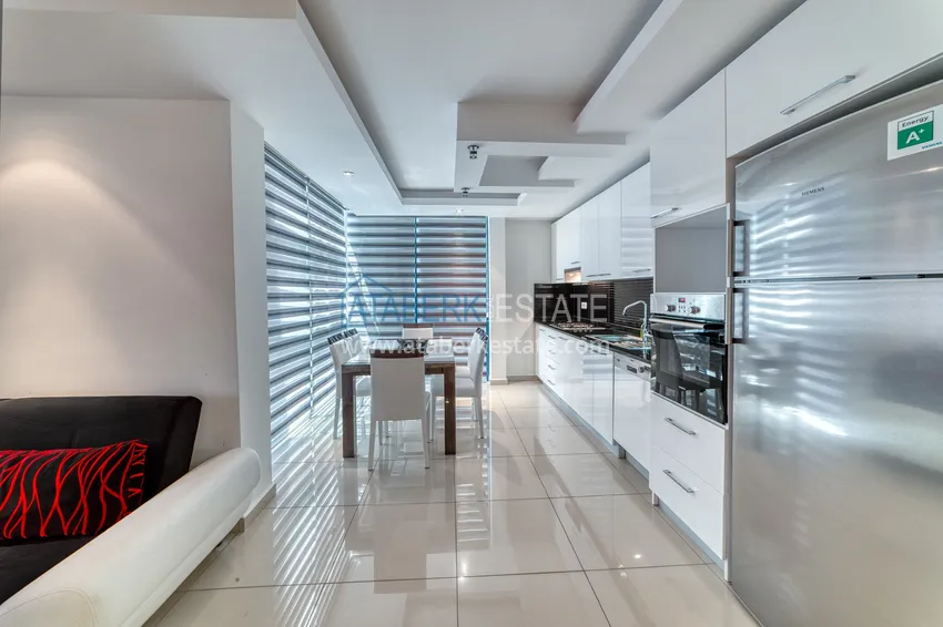 Приобрести Квартира 2+1 меблированная с видом на море и горы, район Джикджилли – Алания 9 