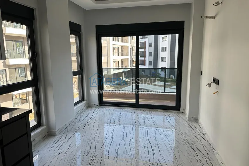 Приобрести Двухкомнатная квартира в Алании в новом современном комплексе - район Оба 2 