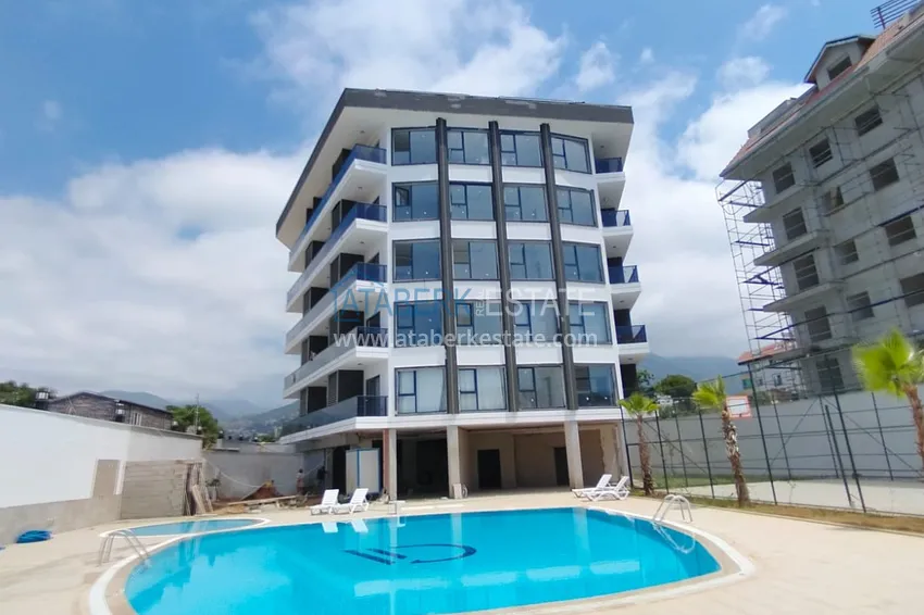 Квартира 1+1 с видом на море в комплексе на завершающем этапе строительства – Каргыджак, Алания 1 