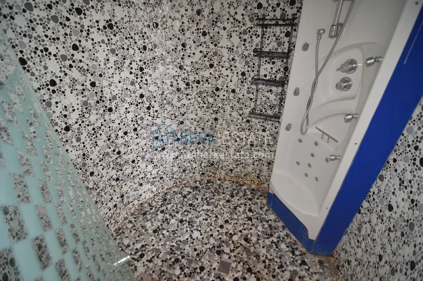 Приобрести Пентхаус-дуплекс 5+2 частично меблированный с видом на море и горы, подходит под гражданство – центр Алании 32