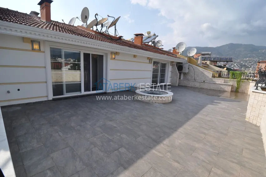 Приобрести Пентхаус-дуплекс 5+2 частично меблированный с видом на море и горы, подходит под гражданство – центр Алании 39