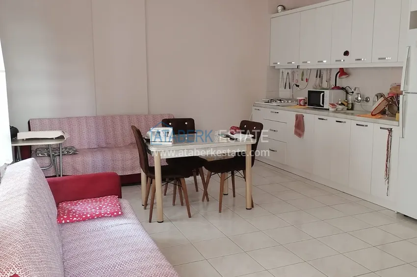 Приобрести Квартира 1+1 с мебелью всего в 100 метрах от моря, район Махмутлар - Алания 3 