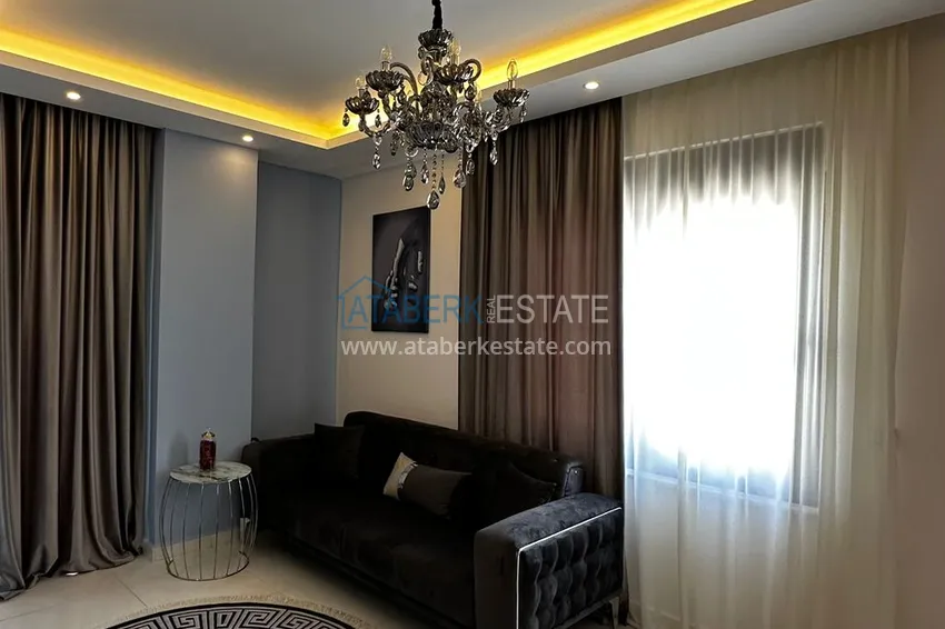 Приобрести Квартира 1+1 меблированная в новом жилом комплексе с инфраструктурой, район Махмутлар – Алания 3 