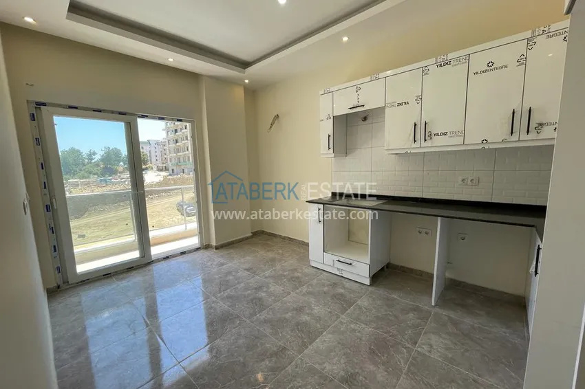 Приобрести Квартира 1+1 с полной чистовой отделкой в Авсалларе в бутик-комплексе 4 