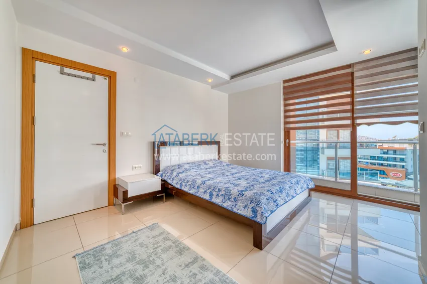 Приобрести Квартира 2+1 меблированная с видом на море и горы, район Джикджилли – Алания 24 