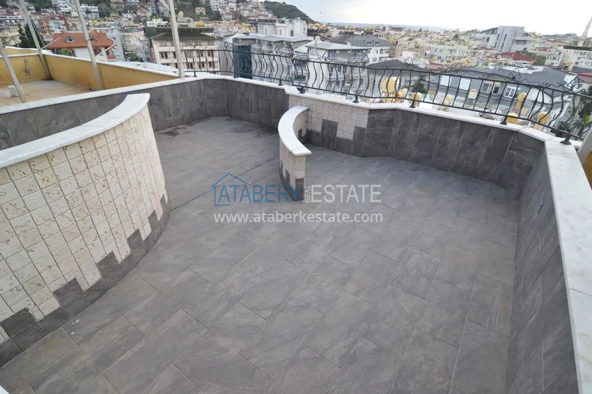 Приобрести Пентхаус-дуплекс 5+2 частично меблированный с видом на море и горы, подходит под гражданство – центр Алании 42