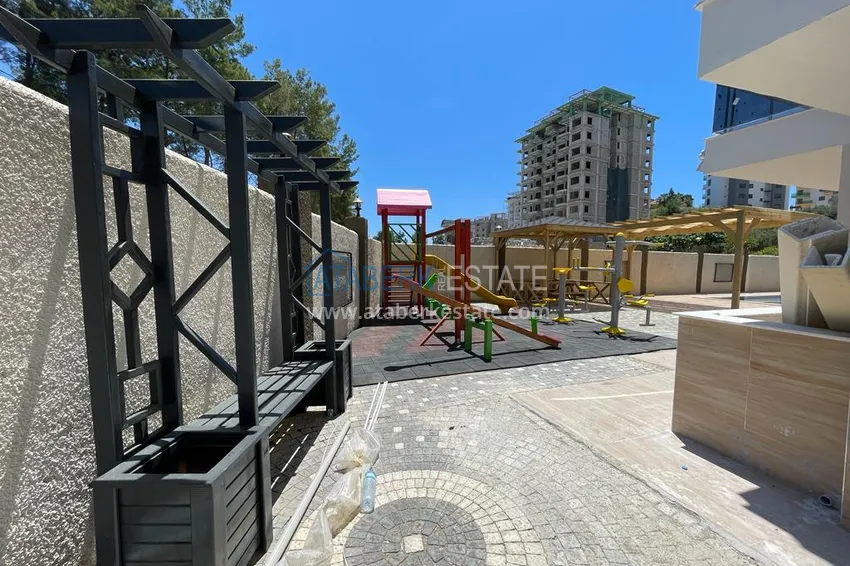 Квартира 1+1 с полной чистовой отделкой в Авсалларе в бутик-комплексе 6 