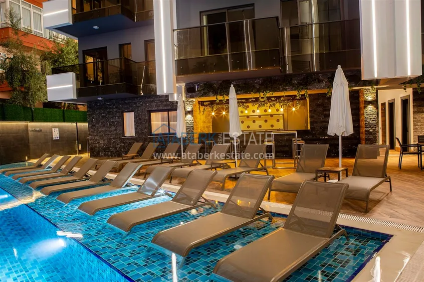 Меблированная квартира с рассрочкой в центре Алании в шикарном жилом комплексе  8 