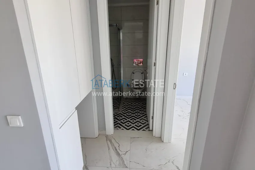 Приобрести Компактная двухкомнатная квартира с чистовой отделкой в 3-х минутах от моря - центр Алании 8 