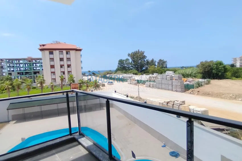 Приобрести Квартира 1+1 с видом на море в комплексе на завершающем этапе строительства – Каргыджак, Алания 8 