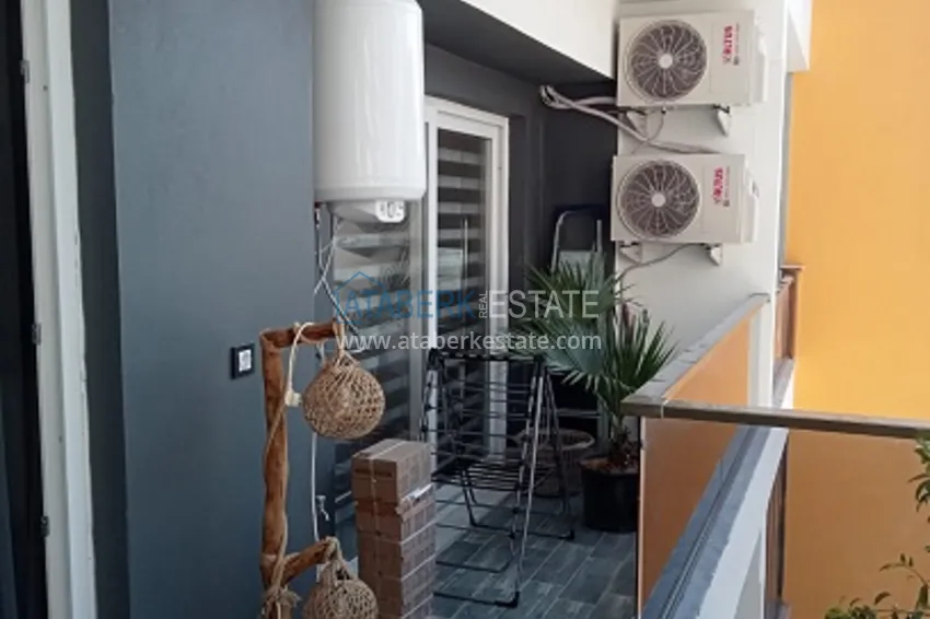 Приобрести Квартира 1+1 в молодом комплексе в 350 метрах от моря Арпачбахшиш – Мерсин 12 