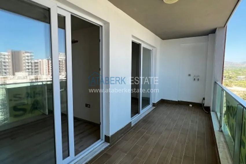 Приобрести Квартира 2+1 с чистовой отделкой в шаговой доступности от моря в районе Тедже – Мерсин 12 