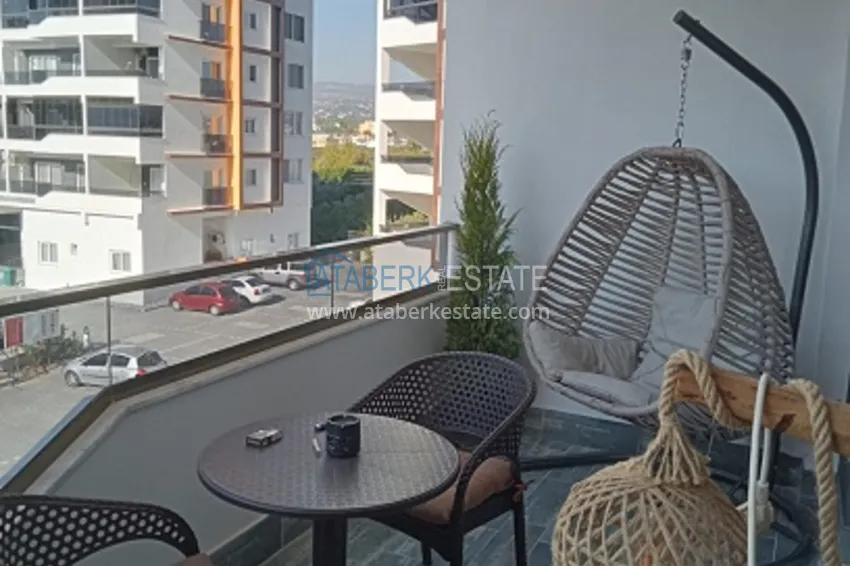 Приобрести Квартира 1+1 в молодом комплексе в 350 метрах от моря Арпачбахшиш – Мерсин 13 