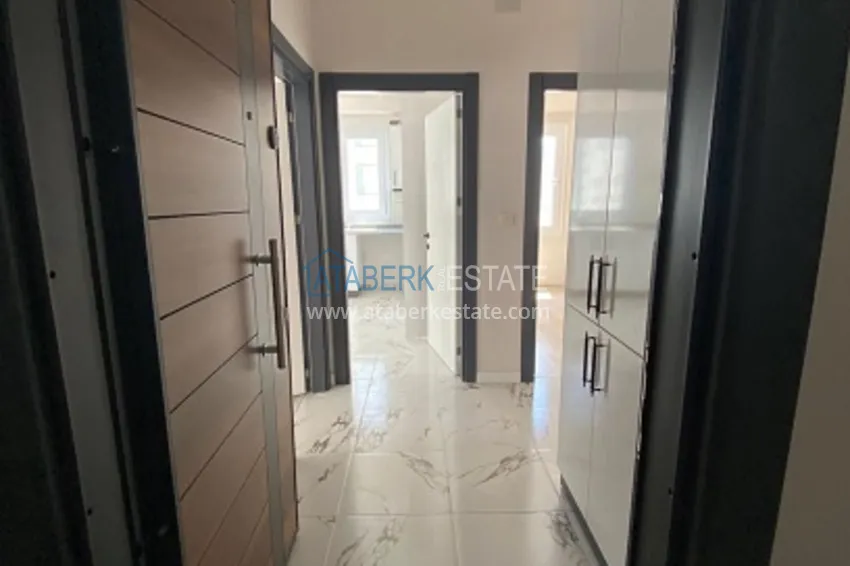 Приобрести Квартира 2+1 с чистовой отделкой в популярном районе Арпачбахшиш – Мерсин 9 