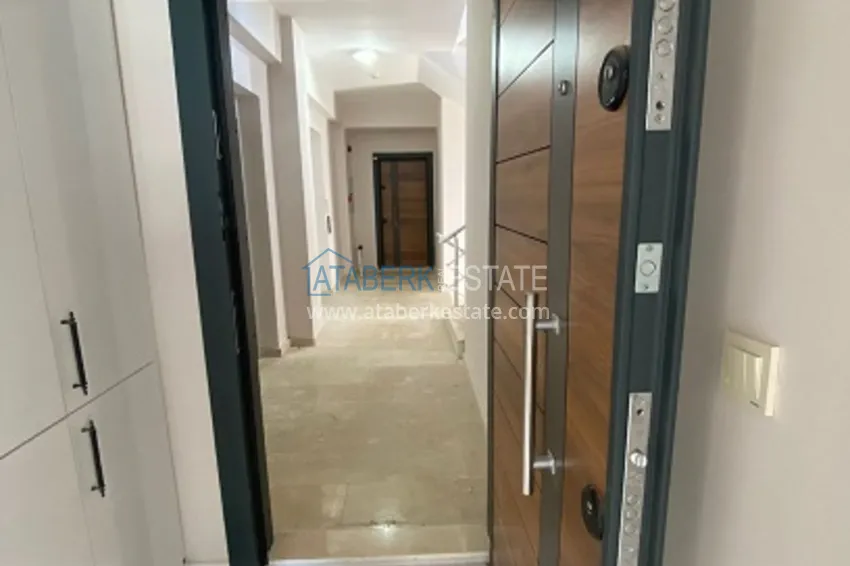 Приобрести Квартира 2+1 с чистовой отделкой в популярном районе Арпачбахшиш – Мерсин 10 