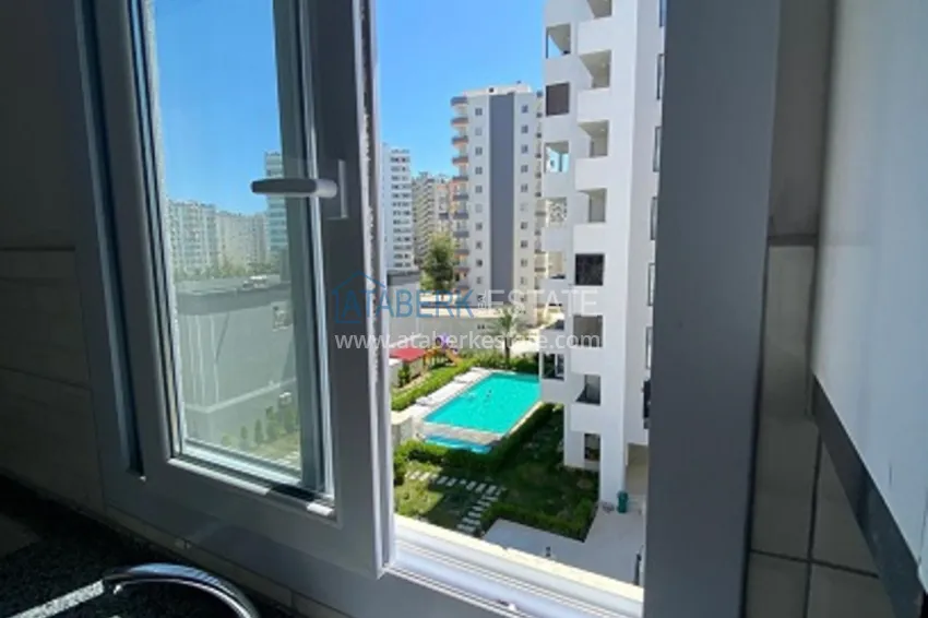 Приобрести Квартира 2+1 с чистовой отделкой в популярном районе Арпачбахшиш – Мерсин 7 