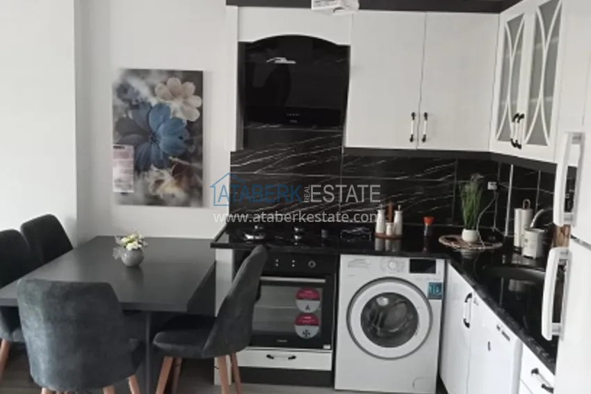 Приобрести Квартира 1+1 в молодом комплексе в 350 метрах от моря Арпачбахшиш – Мерсин 6 