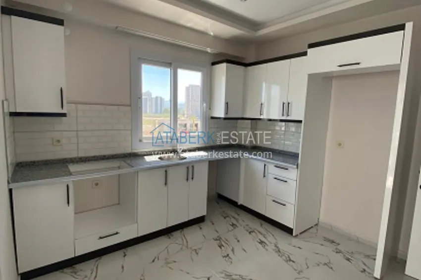 Приобрести Квартира 2+1 с чистовой отделкой в популярном районе Арпачбахшиш – Мерсин 8 