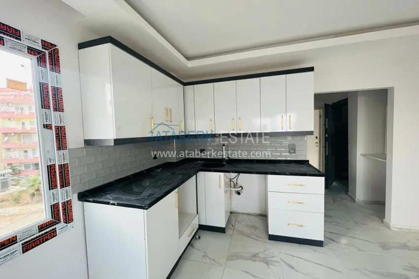 Приобрести Квартира 1+1 с чистовой отделкой и видом на море в районе Аяш, Мерсин, 50 м2 3 