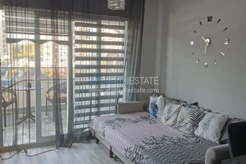 Приобрести Квартира 1+1 в молодом комплексе в 350 метрах от моря Арпачбахшиш – Мерсин 2 