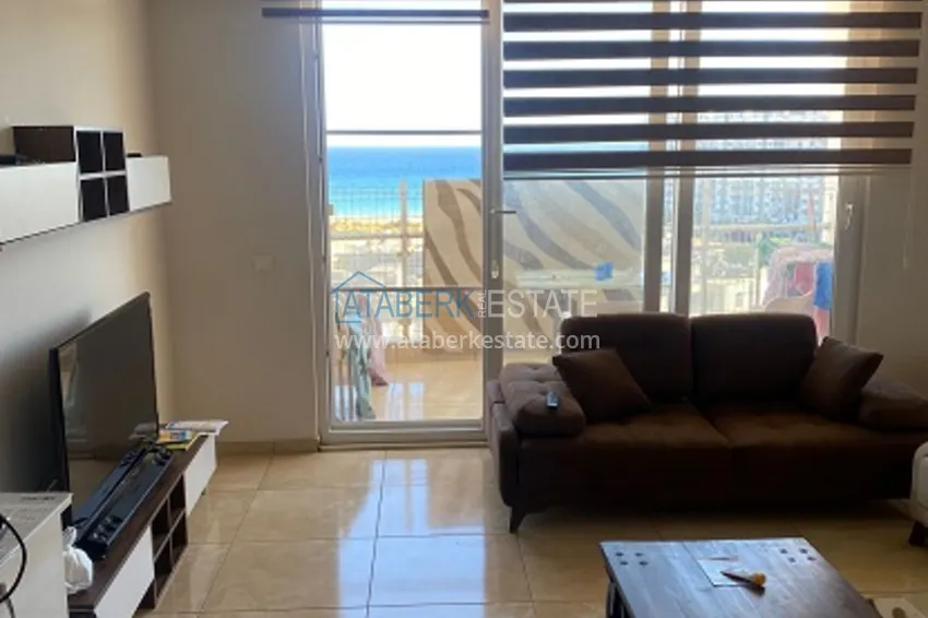 Приобрести Квартира 1+1 с видом на море в комплексе с отельной инфраструктурой район Чешмели – Мерсин 2 