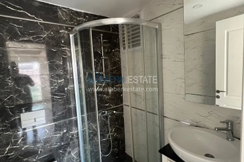 Приобрести Квартира 2+1 с чистовой отделкой в 50 метрах от моря в районе Тедже – Мерсин 10 