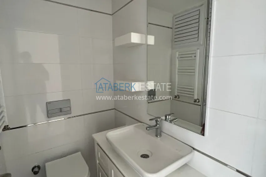 Приобрести Квартира 2+1 с чистовой отделкой в 50 метрах от моря в районе Тедже – Мерсин 11 