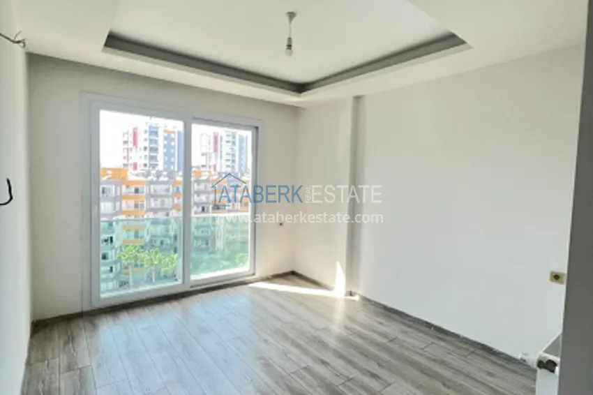 Приобрести Квартира 2+1 с чистовой отделкой в 50 метрах от моря в районе Тедже – Мерсин 4 