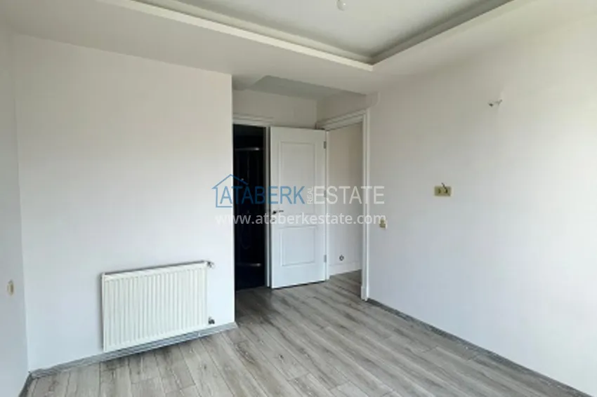 Приобрести Квартира 2+1 с чистовой отделкой в 50 метрах от моря в районе Тедже – Мерсин 5 