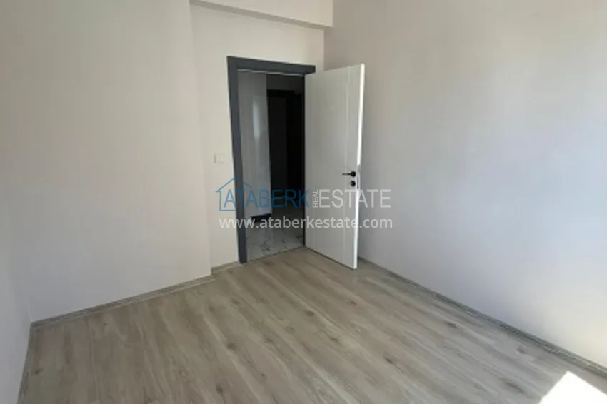 Приобрести Квартира 2+1 с чистовой отделкой в популярном районе Арпачбахшиш – Мерсин 6 