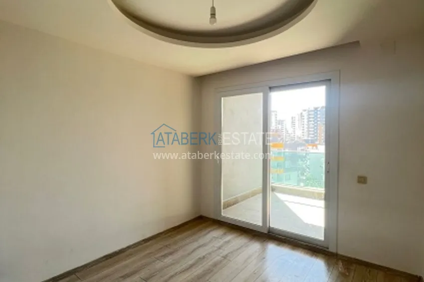 Приобрести Квартира 2+1 с чистовой отделкой в 50 метрах от моря в районе Тедже – Мерсин 6 