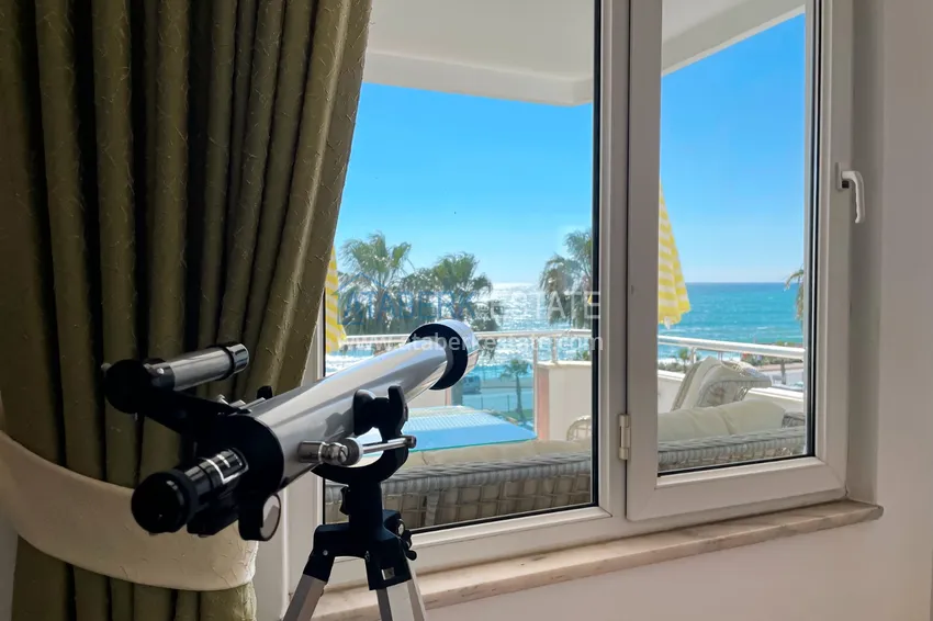 Приобрести Роскошная линейная квартира «под ключ» на первой береговой линии в курортном районе Тосмур, Алания 14